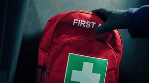 Medical First Aid Bag Is Picked Up Or Put Down