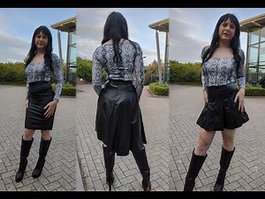 Crossdresser Wearing Boots and Trying on Skirts