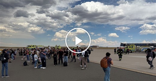 Passengers Evacuate Burning Plane in Denver
