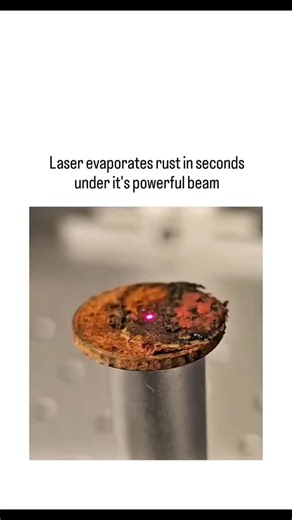 viral hub on Instagram: "video showcases laser ablation on a rusty metal disk, where a high-energy beam vaporizes iron oxide into plasma sparks, revealing pristine copper underneath in under 70 seconds without contact or residue. Scientifically, the process exploits rust's higher light absorption than base metal, heating contaminants to 3,000–10,000°C for instant evaporation, per ablation studies in journals like Processes (2023), outperforming chemical methods by avoiding secondary pollution. E