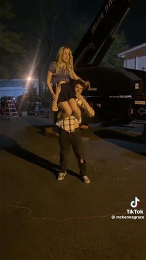 Mason thames carrying mckenna grace on the shoulder in the movie regretting you