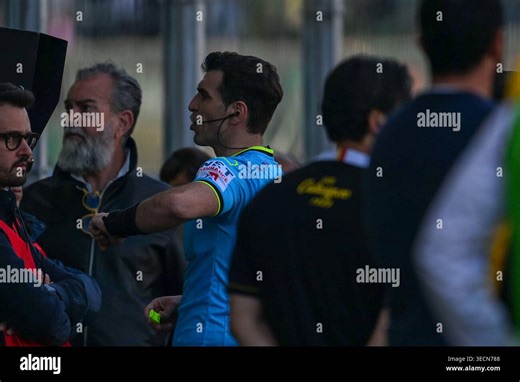 The referee Claudio Giuseppe Allegretta checks the V.A.R. (Video Assistant Referee) during the Italian Serie BKT match between Palermo F.C. vs U.S. Catanzaro 1929, 1st May 2026 at the Renzo Barbera stadium in Palermo, Italy Stock Photo - Alamy