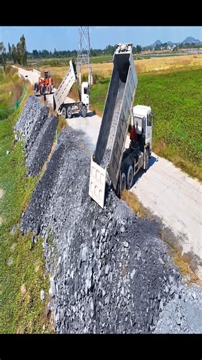 34K views · 268 reactions | EP05!Wow Amazing! Work on new projects, unload a 25-ton truck, and push a dump truck with a wheel loader. The challenging chore of tossing boulders into the deep lake requires a group of knowledgeable landowners to work fast in order to maintain high-volume, high-quality operations. with their exceptional talent. | Lewis Mcinally | Facebook