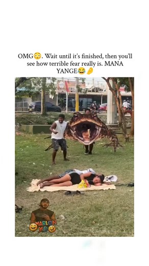 memer boy on Instagram: "The post features a humorous prank video where a woman sunbathing in a park is startled by a person in a giant frog costume approaching as if to devour her, ending in relieved laughter upon the reveal, overlaid with playful Mario Kart emojis for added comedy. Posted by Rwandan user @sindaza , a telecommunications professional who frequently shares viral African skit videos, this clip has garnered over 11 million views and 44,000 likes since 18 January 2026, highlighting