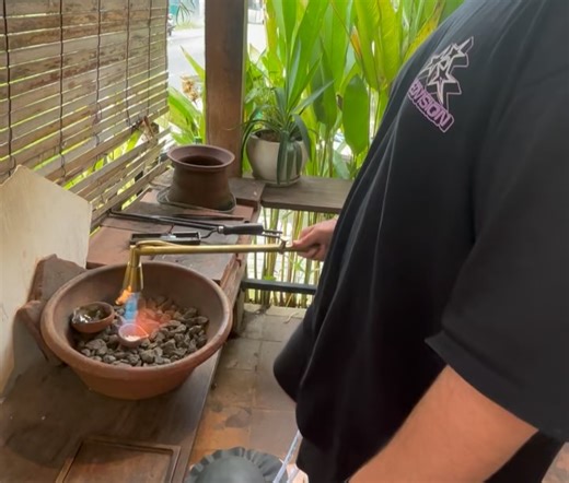 Scribbling Barefoot on Instagram: "Silversmith course in Canggu, Bali. Joe and I made rings. Great fun using all their gear. My ring has the mountains, sea, palm trees and the sun."
