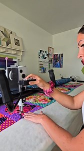 Let’s talk about what happens after I reach the bottom edge of the quilt ⬇️ Because I don't float my quilts, I pin them to my leaders. So when I reach the end, I advance the quilt so that the bottom edge of my final pass is fully in my throat space. Then comes the fun part... I remove all of my corsage pins, baste using my single-stitch method, and yep—glide my hand along the fabric to help smooth it as I go. ✨ Yes, the quilt police have had thoughts about this... but trust me, I’m super cautiou