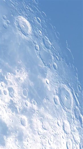 A moment was captured where something appears to hit the Moon surface during daytime. In most cases, this is caused by a small meteoroid striking the Moon. Because the Moon has no atmosphere, space rocks do not burn up and can impact the surface directly. The flash or bright mark seen may last only a fraction of a second. High zoom, lighting angle, and camera movement can make the impact look more dramatic than it is. Astronomers regularly observe such events to understand meteoroid activity in 