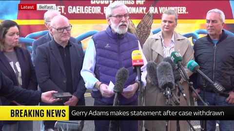 Gerry Adams reacts to case withdrawal