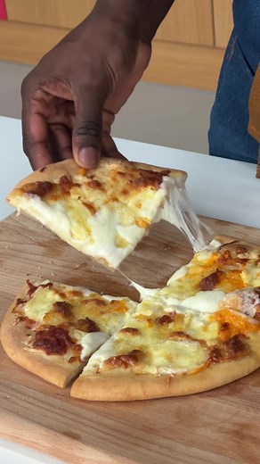 A lovely cheese pizza, just for you 🎄 It's that time of year – save those little scraps of cheese from your cheeseboard and make our quick pizza dough recipe (or use ready-made), then get it all melted together ready to settle in front of your favourite Christmas film 🎅 What are you watching? Let us know in the comments 🎬 and search 'quick pizza dough' on the Good Food app for the recipe. Leftover cheese pizza Prep: 15 mins Cook: 25 mins Serves 2 EASY 1x 220g ball of pizza dough Plain flour,