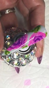 62K views · 190 reactions | @gellico_official Blooming Ink tutorial by @dymenails  Step 1 Start with a matte grey base. Step 2 Apply pink ink to create the shape of the flower. Then, apply one drop of ink at a time to create petals. Allow to dry between drops. Step 3 Use a brush dipped in acetone to add detail. Step 4 Apply green and yellow ink drops to create leaves. Finish with top coat. | Nailpro | Facebook