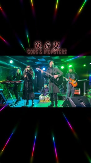 N&Y Band on Instagram: "Gods & Monsters: the song of Lana Del Rey performed by @nybandofficial in collaboration with @jayant.das.96 at @tepliy_lampoviy_art_club Gothica Fest: X-MAS by @gothicamagazine December 2025 "Gods and Monsters" is a confession whispered in neon twilight, where holiness and sin twist into a single, decadent knot. It is a siren song of a lost paradise, where Lana Del Rey dances upon the shards of innocence under the watchful, hollow gaze of Hollywood idols... This song took