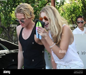 MIAMI BEACH, FL - MARCH 14: Victoria's Secret model Gigi Hadid, Rachel Hilbert and Singer Cody Simpson party on South Beach on March 14, 2015 in Miami Beach, Florida.   People:  Gigi Hadid, Cody Simpson Stock Photo - Alamy