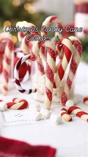 @thefeedfeed on Instagram: "These Candy Cane Cookies by @deliciousbyjuju are a fun & festive holiday dessert that comes together with just a few ingredients. Comment ‘RECIPE’ to have the details sent to your DMs and keep tagging #feedfeed for a chance to be featured. INGREDIENTS: 125 grams cold butter, cut into cubes 80 grams granulated sugar or 40 grams sweetened condensed milk 1 teaspoon vanilla extract 1 egg 250 grams all-purpose flour, sifted Red gel food coloring Crystal sugar, for decorati