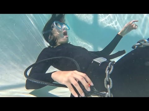 Chained Underwater Scuba Peril