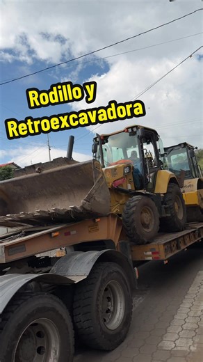 Heavy Machinery in Action: Rollers and Backhoes