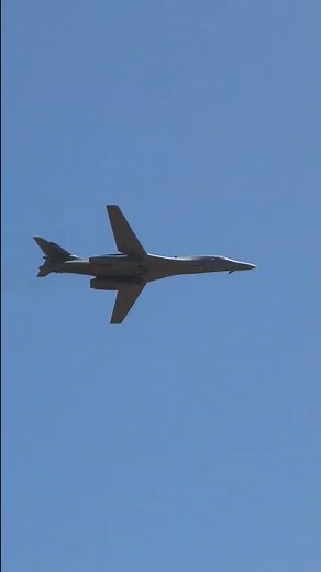 Rockwell B-1 Lancer fly over supersonic variable-sweep wing heavy bomber at Travis Air Force base