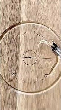 carving a beautiful and detailed pattern on a piece of wood using a sharp professional chisel tool