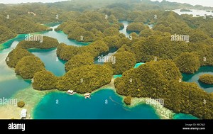 Aerial view: Bucas Grande Island, Sohoton Cove. Philippines. Tropical sea bay and lagoon, beach. Tropical landscape hill, clouds and mountains rocks with rainforest. Azure water of lagoon. Shore Landscape Bay. Aerial video.Seascape. Travel concept Stock Photo - Alamy