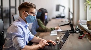 Working in an office instead of remotely may double COVID risk: CDC