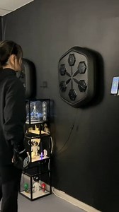 Introducing the revolutionary Music Boxing Training Machine! Get ready to unleash your inner fighter and take your fitness game to new heights. This cutting-edge device is a game-changer, designed to make your boxing training sessions more exhilarating than ever before. With its sleek and compact design, this machine is perfect for home use, ensuring you can train whenever and wherever you want. But that's not all - this incredible device also syncs with your favorite music, allowing you to trai