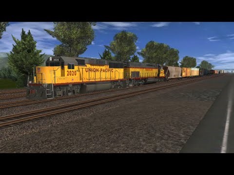 Union Pacific GP60 and SD40T-2 Pulling Freight.