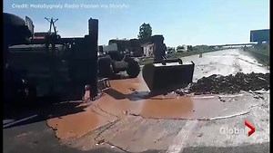 Cleanup crews scrape massive amount of chocolate off of highway in Poland