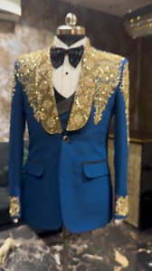 Blue with a touch of gold = pure bold.” Every stitch in this tuxedo whispers luxury, every golden motif reflects regality. Enigma Xclusive redefining the groom’s wardrobe • Blue Tuxedo • Gold Embroidery • Groom Outfit 2025 • Royal Groom Wear • Luxury Tuxedo • Designer Groom Suit • Handwork Tuxedo • Enigma Xclusive • Wedding Reception Outfit • Cocktail Party Look • Groom Fashion Trends • Statement Tuxedo • Blue & Gold Suit • Regal Groom Wear • Modern Groom Style #RoyalGroom #LuxuryTuxedo #BlueAnd