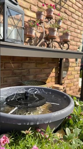 Summer backyard patio tour starring my diy solar fountain planter!