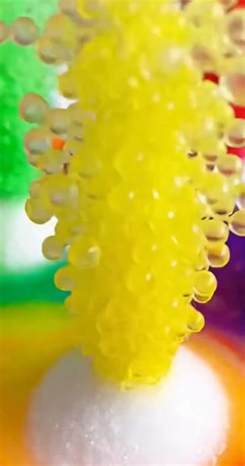 Amazing Growing Sugar Towers Experiment 😱 You'll Need: White sugar Food coloring Plate Hot water Baking soda Instructions: Create six small piles of sugar on a plate. Add a drop of different food coloring to each pile. Mix hot water with extra sugar and a spoonful of baking soda. Carefully pour the hot liquid into the center of the plate. Watch as the sugar mounds absorb the liquid and grow. How It Works: The sugar mounds pull the liquid in through capillary action. The combination of heat and 