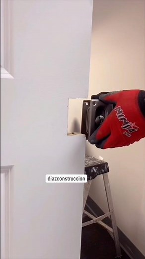 Install a pocket door lock and pull handles