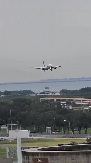 Boeing 747 Landing at Airport: A Scenic View