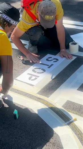 Equus Striping prepares to stencil a traffic garden intersection