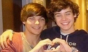 One Direction: Louis says gay rumours have to stop.