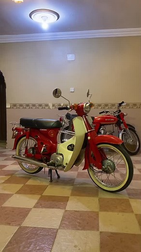 Vintage Honda Motorcycle Showcase with Chrome Detailing