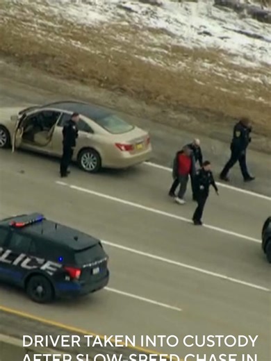 A driver was taken into custody after a long, slow-speed police chase through the north suburbs on I-294 and I-94 Wednesday morning.