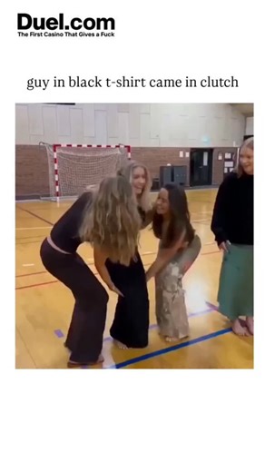 OG CLIPPER on Instagram: "- The post shares a 30-second video montage of young people performing synchronized backflips in a gym, often in unexpected outfits like dresses or suits, captioned to spotlight a "guy in black t-shirt" for a standout flip, amassing 6.6 million views and 61,000 likes. - Replies spark humor by pointing out no black t-shirt appears in the footage, with one quipping "the 't' in that guy's t-shirt is silent," amplifying the post's meme potential through collective fact-chec