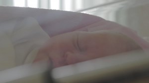 Newborn baby falling asleep in hospital | Premium Stock Video Footage