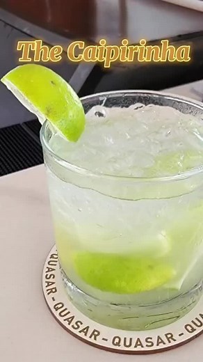 The best and easiest caipirinha is here you'll need one key lime, simple syrup, cachaca, and crushed ice #tiktokcocktails #diy #easyrecipe #yatchlife #bartenderlife #diycocktail #cachaça #caipirinha