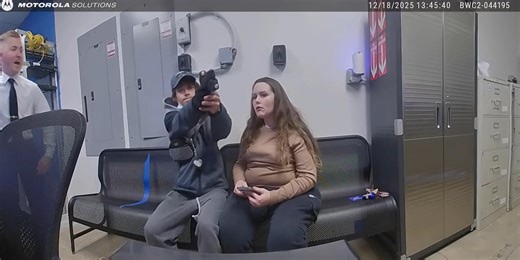 Man caught on camera trying to shoot police officer in loss prevention room at Walmart