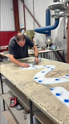 Fabricating built up stainless steel signage