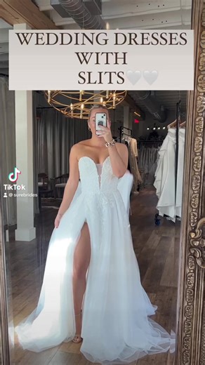 Wedding gowns with slits!!✨💖 Unleash your fun side with a touch of sass in these fun wedding gowns!!🤩•Can you pick a favorite?!1)Kat🤍2)Ryleigh🤍3)Petra🤍4)Audrey🤍5)Effie🤍#weddingdresswithslit #elegantwedding #ballroomwedding #bridetobe #bride2024💍 #weddingphotography #newnanga #atlantabridalhair #squareneckweddingdress #weddingdresseswithsleeves #weddinginspiration #fallweddinginspiration #weddinginspo #ballgownweddingdress #fittedweddingdress | Surebride