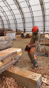 Nate doing a little spot clean up so we can make a precise cut on clean wood💪 | Langberg Log Homes