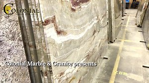 Nacarado Quartzite is an intricate stone from Brazil. It contains shades of beige, off-white, ivory, and deep plum that spreads into a rust color with exceptional veining throughout. 👀 it for yourself at our nearest showroom: https://buff.ly/2TVWLLd. | Colonial Marble & Granite
