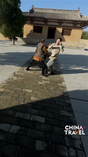 In the courtyard of Tang Dynasty Guangrenwang Temple in Shanxi, a master and his apprentice practice Chinese martial art Xingyi Quan, a style focusing on inner energy and precise moves.#kungfu #chinatravel | CGTN