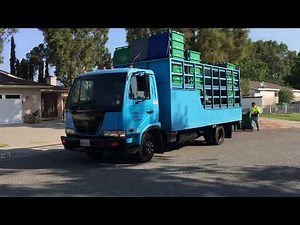WM Front Loader On Bulk And Cart Delivery Truck