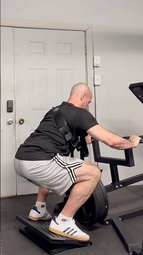 Belt squat setup using Squat Harness V4 and Titan chest supported row machine