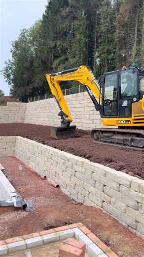 Wotblock walls almost complete now. Great progress made on these walls last few months, really finishing these terraced lawns nicely. Well done to all involved! | Ian O'Brien & Son