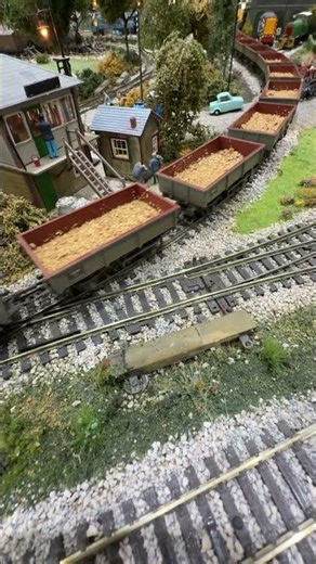 20309 pulling ore past the Invacar.