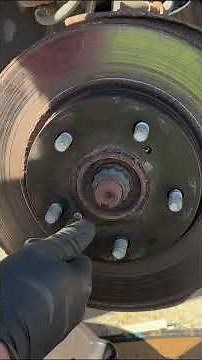 Stuck Brake Rotor Won’t Come Off? How to Remove a Rusted Rotor Fast Under 1 Minute #mcfixit #shorts