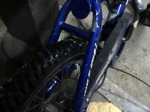 how to make a motorized bike/chainsaw bike friction drive